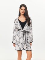 Front view of the BEYOURA Bailey Thong sculptLOVE bodysuit in black styled with robe