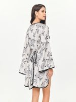 Back side view of the BEYOURA Riley Kimono-Style Hush Robe in marshmallow showing tie detail and flowy hemline