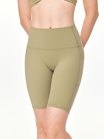 Close-up front view of the BEYOURA Elliana Sculpted luxeFIT Biker Shorts in Sage Green