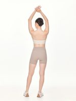 Full back view of the BEYOURA Elliana V-Line luxeFIT Shorts in beige