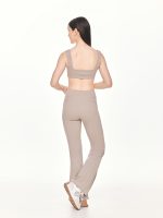 Full back view of the BEYOURA Estelle Flared luxeFIT Leggings in beige