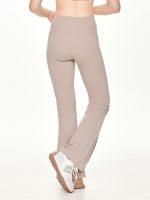 Close-up back view of the BEYOURA Estelle Flared luxeFIT Leggings in beige