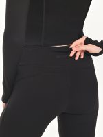 Close-up back view of the BEYOURA Estelle Flared luxeFIT Leggings in black