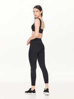 Full side-back view of the BEYOURA Estelle Stretch & Stash luxeFIT Leggings in black