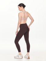 Full side-back view of the BEYOURA Estelle Stretch & Stash luxeFIT Leggings in brown